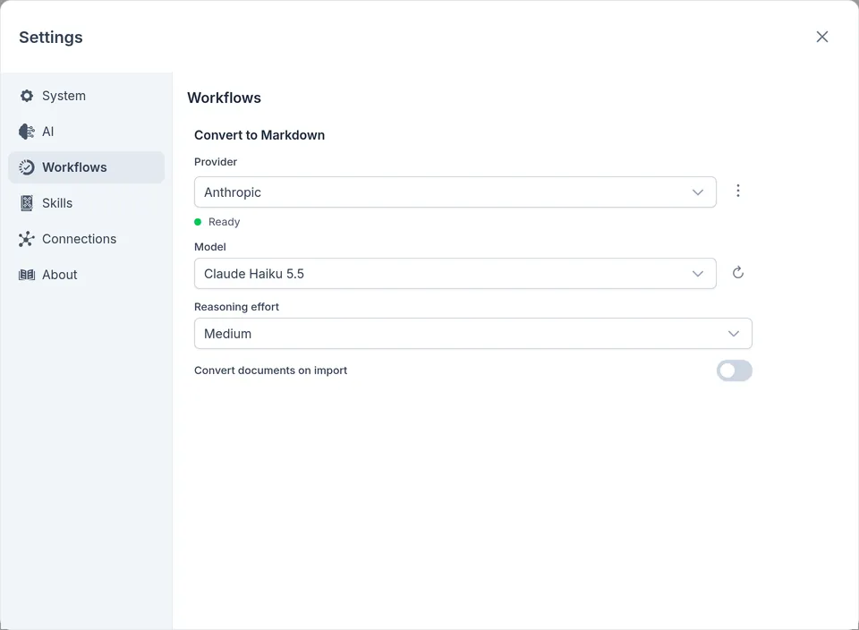Settings › Workflows, with the model Convert to Markdown runs on